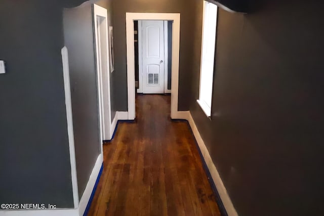 hall featuring dark hardwood / wood-style floors