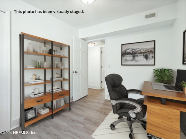 office area with light hardwood / wood-style flooring