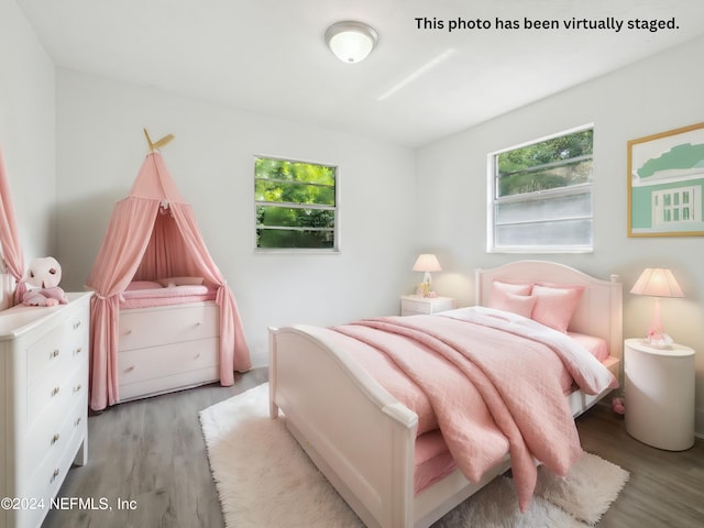 bedroom featuring hardwood / wood-style floors