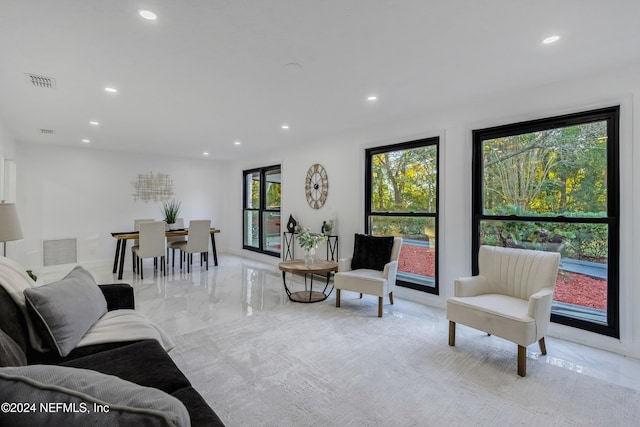 living room featuring plenty of natural light