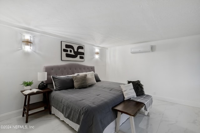 bedroom with an AC wall unit