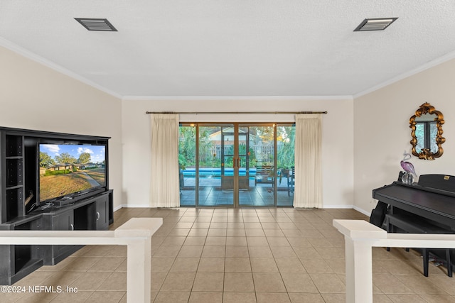 living room featuring tile patterned floors, crown molding, and a textured ceiling