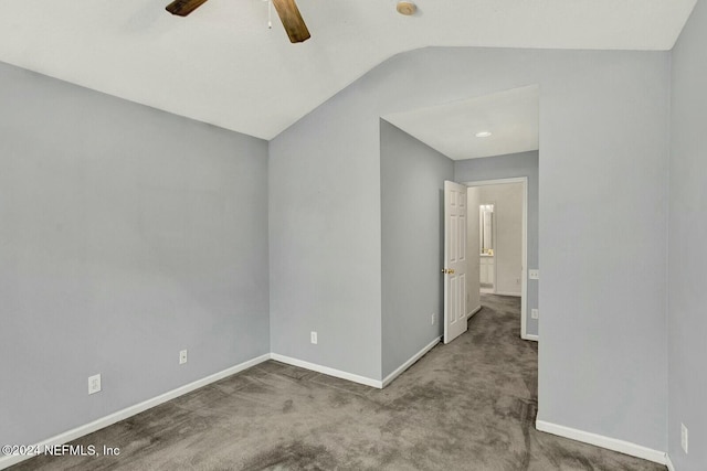 unfurnished room with ceiling fan, carpet, and lofted ceiling