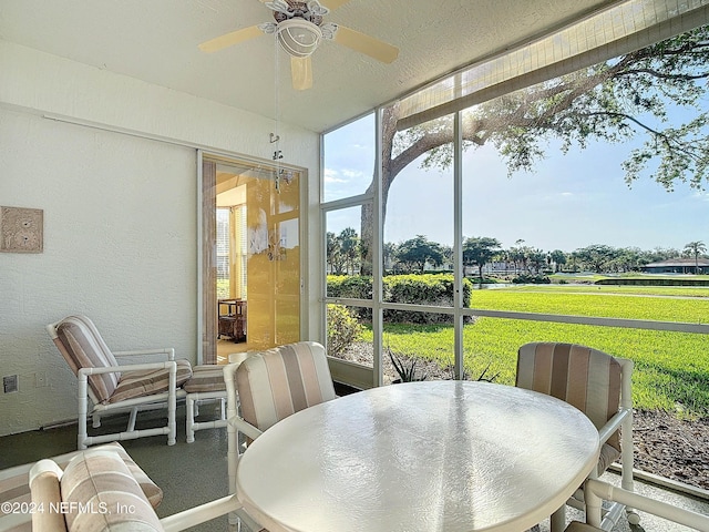 sunroom / solarium with ceiling fan