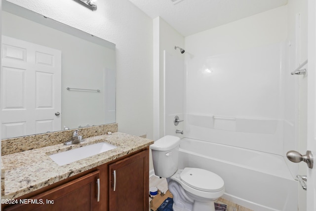 full bathroom featuring vanity, toilet, and shower / washtub combination