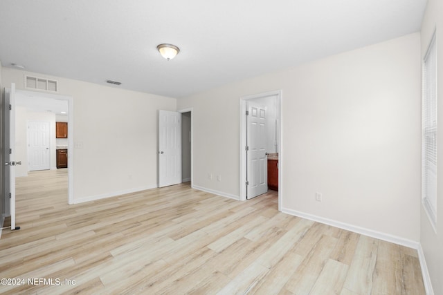 unfurnished bedroom with light hardwood / wood-style flooring