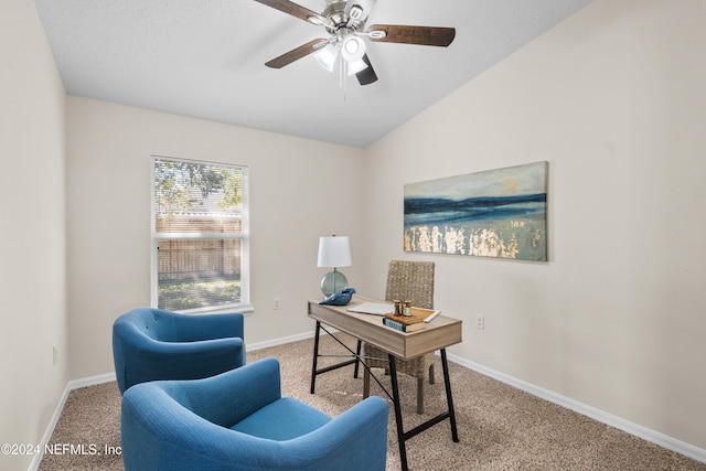 carpeted home office featuring ceiling fan and lofted ceiling