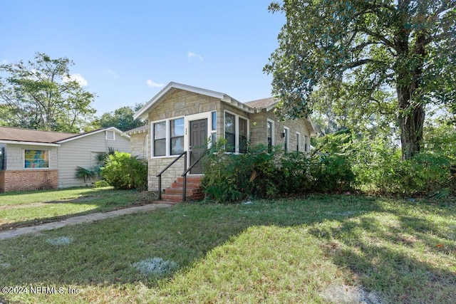 view of front of house with a front yard