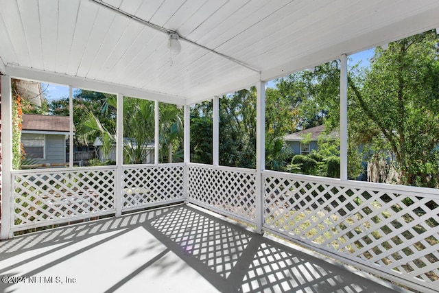 sunroom with wood ceiling