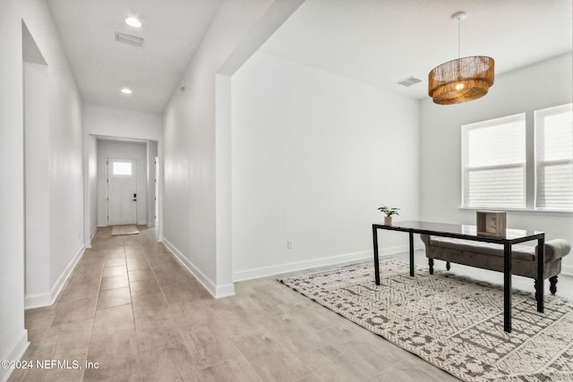 hall featuring light wood-type flooring