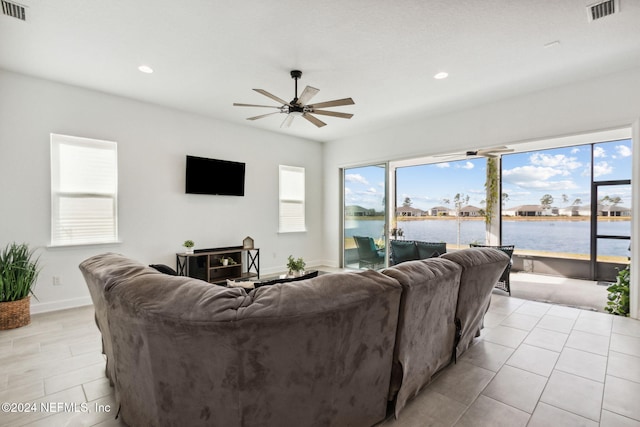 living room with ceiling fan