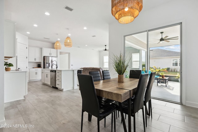 dining room with ceiling fan