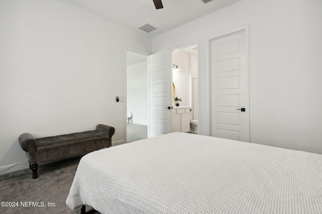 carpeted bedroom featuring ensuite bathroom and ceiling fan