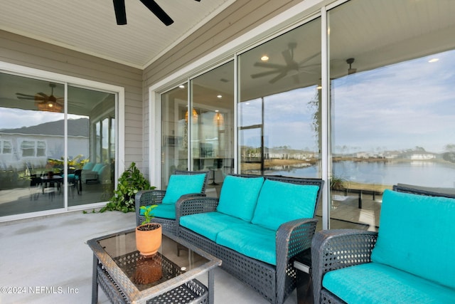 view of patio / terrace featuring an outdoor living space and a water view