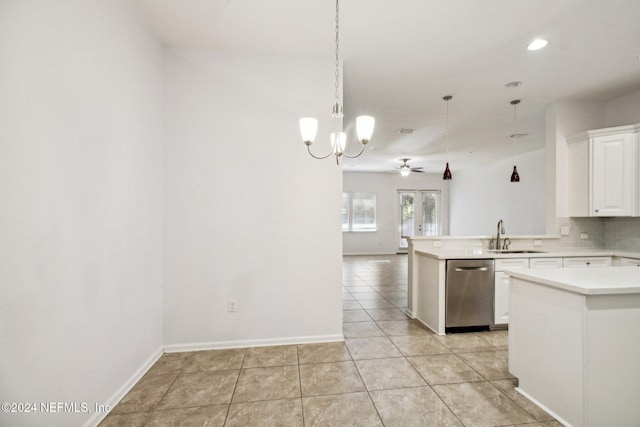 kitchen with backsplash, sink, kitchen peninsula, ceiling fan, and white cabinetry