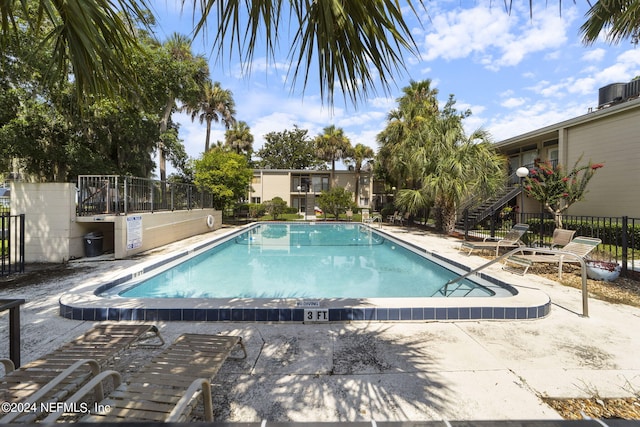 view of pool with a patio area