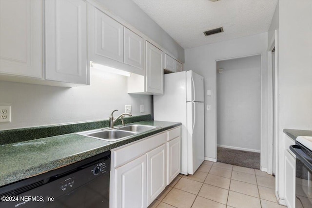 kitchen with black appliances, white cabinets, sink, and a textured ceiling