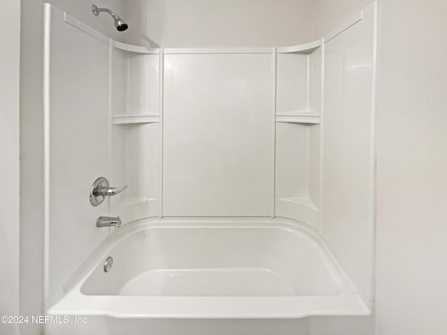 bathroom featuring washtub / shower combination