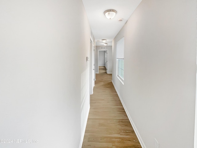 hall featuring light hardwood / wood-style flooring