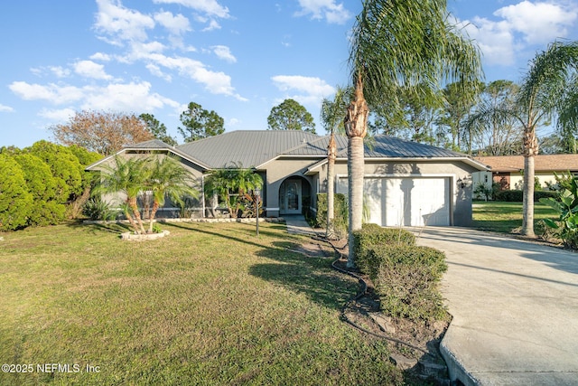 ranch-style home featuring a garage and a front lawn