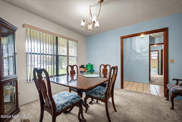 dining room with a wealth of natural light, light carpet, and an inviting chandelier