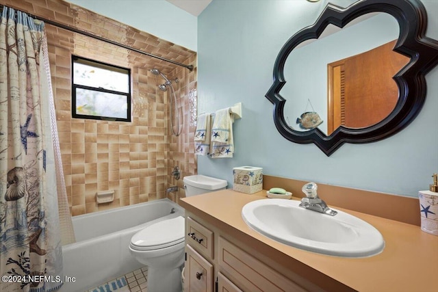 full bathroom featuring tile patterned flooring, shower / bath combination with curtain, toilet, and vanity