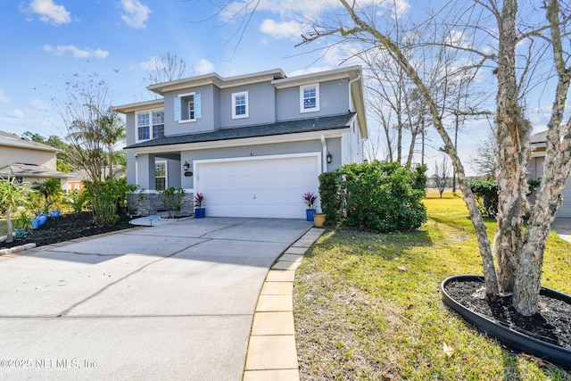 view of front of home with a garage and a front lawn