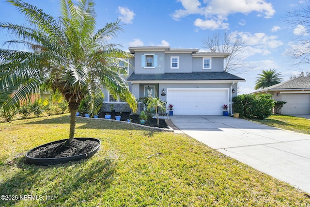 view of property featuring a garage and a front yard