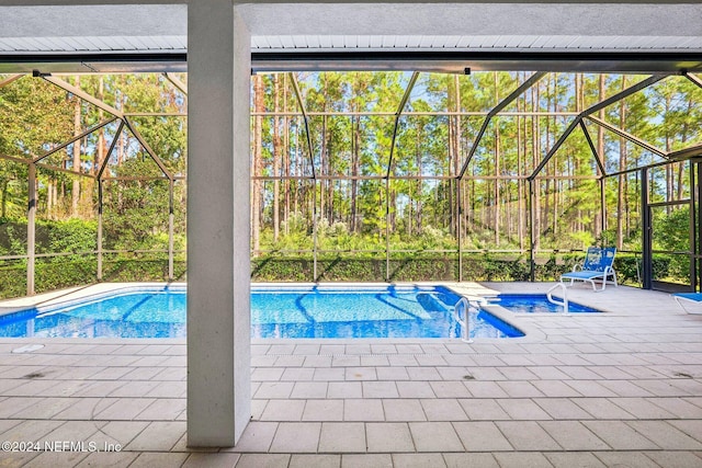 view of pool featuring a patio area