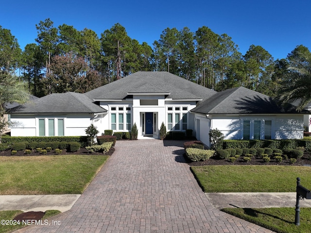 view of front facade with a front lawn