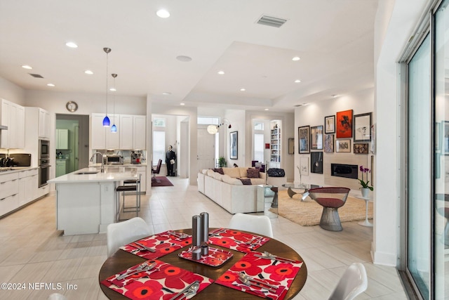 dining space with sink