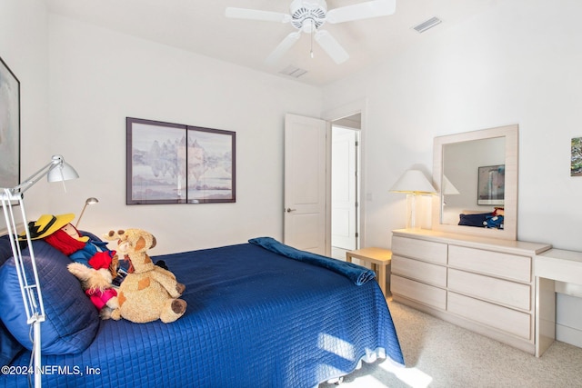 bedroom with light colored carpet and ceiling fan