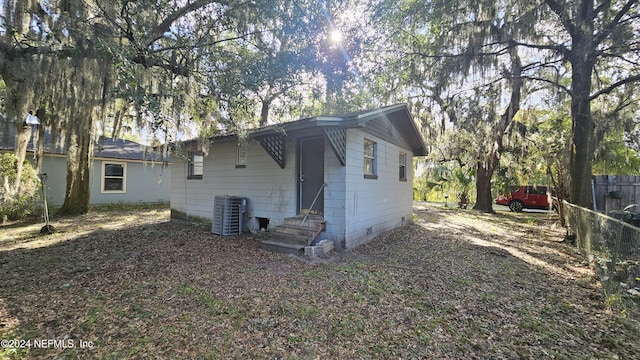 exterior space with central air condition unit