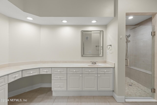 bathroom featuring tile patterned floors, a shower stall, vanity, and recessed lighting