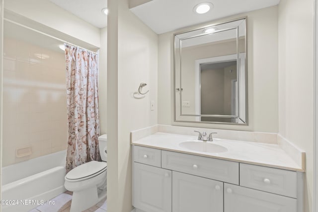 full bathroom featuring vanity, shower / bath combination with curtain, and toilet