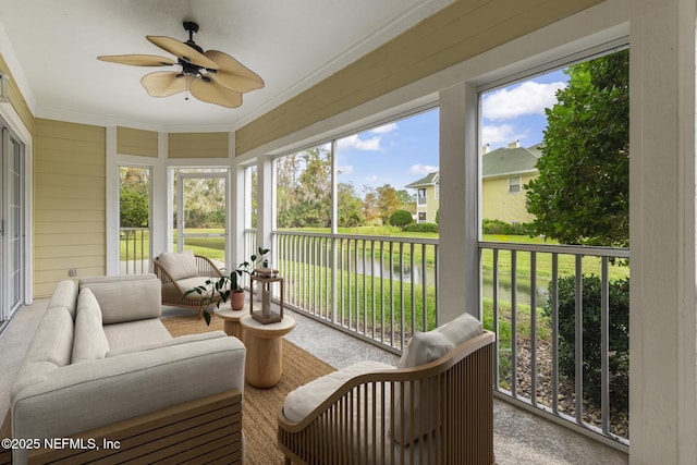 sunroom with a ceiling fan