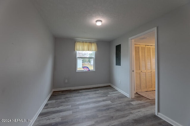 206 Citizen St, Green Cove Springs, FL 32043 - empty room with hardwood / wood-style floors and electric panel