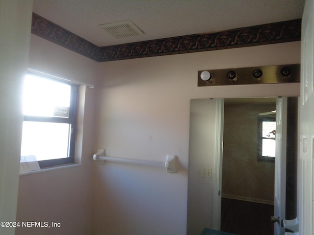 bathroom featuring plenty of natural light