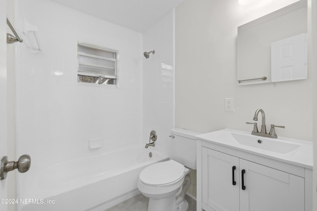 full bathroom featuring vanity, toilet, and tiled shower / bath