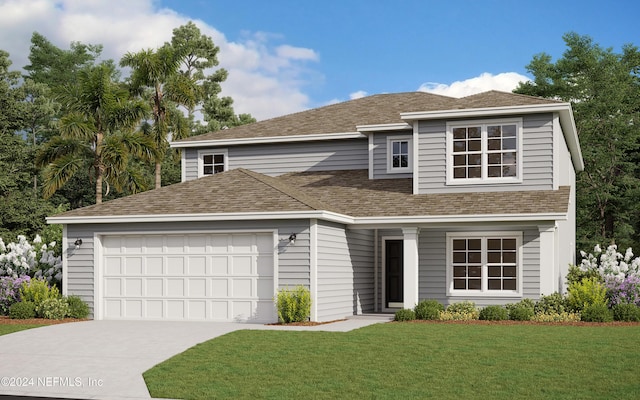 view of front of property with a front yard and a garage