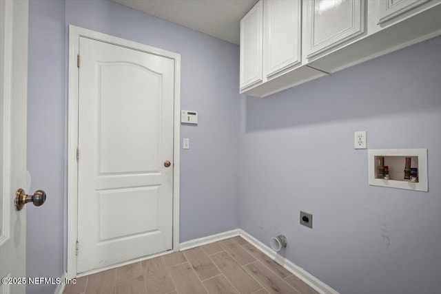 laundry room featuring cabinets, hookup for a washing machine, hookup for an electric dryer, and light wood-type flooring