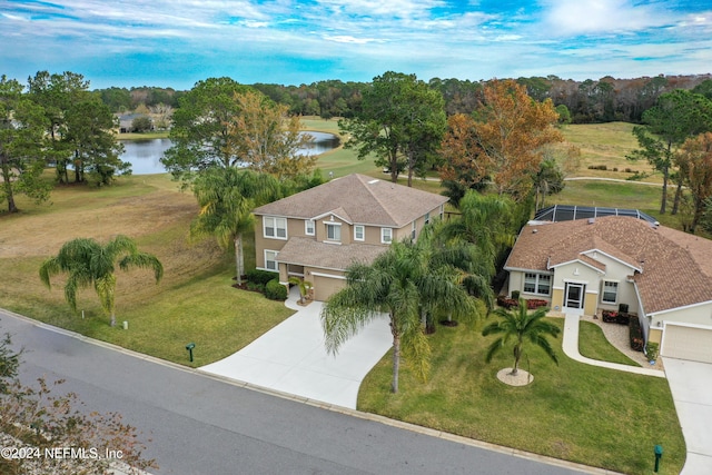 drone / aerial view with a water view