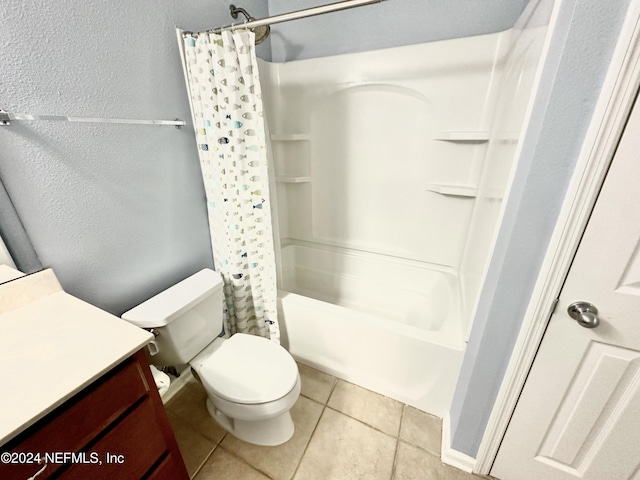 full bathroom featuring tile patterned flooring, shower / bath combo, vanity, and toilet