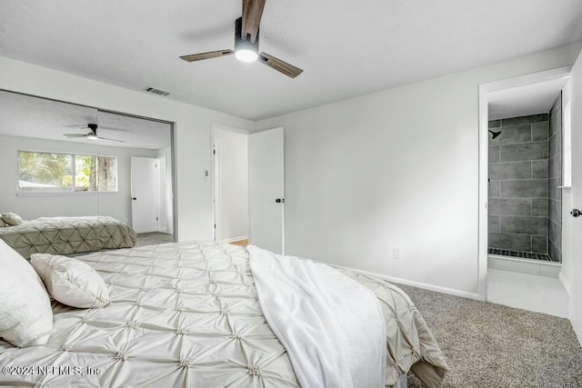 carpeted bedroom with ceiling fan