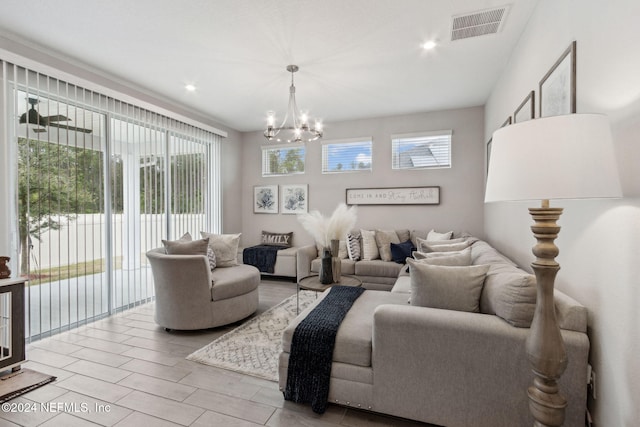 living room featuring an inviting chandelier