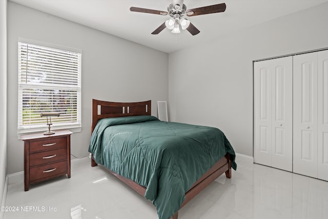 bedroom with a closet and ceiling fan