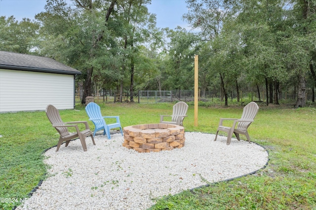 view of patio / terrace with an outdoor fire pit