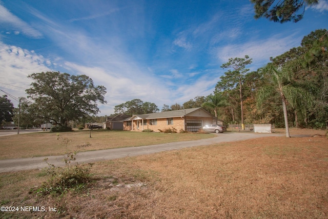 view of yard featuring a garage