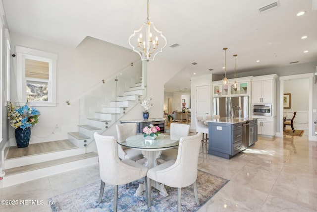 dining room with an inviting chandelier