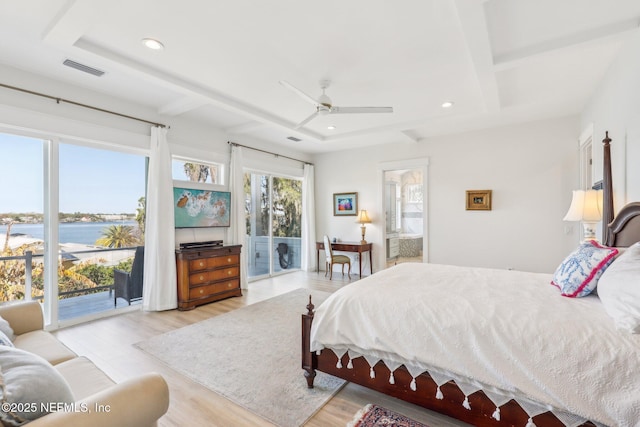 bedroom featuring access to exterior, ceiling fan, beamed ceiling, and light wood-type flooring